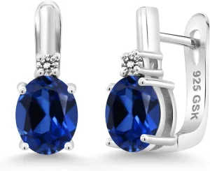 Gem Stone King 925 Sterling Silver Blue Created Sapphire and White Diamond Earrings For Women (4.73 Cttw, Gemstone September Birthstone, Oval 9X7MM)